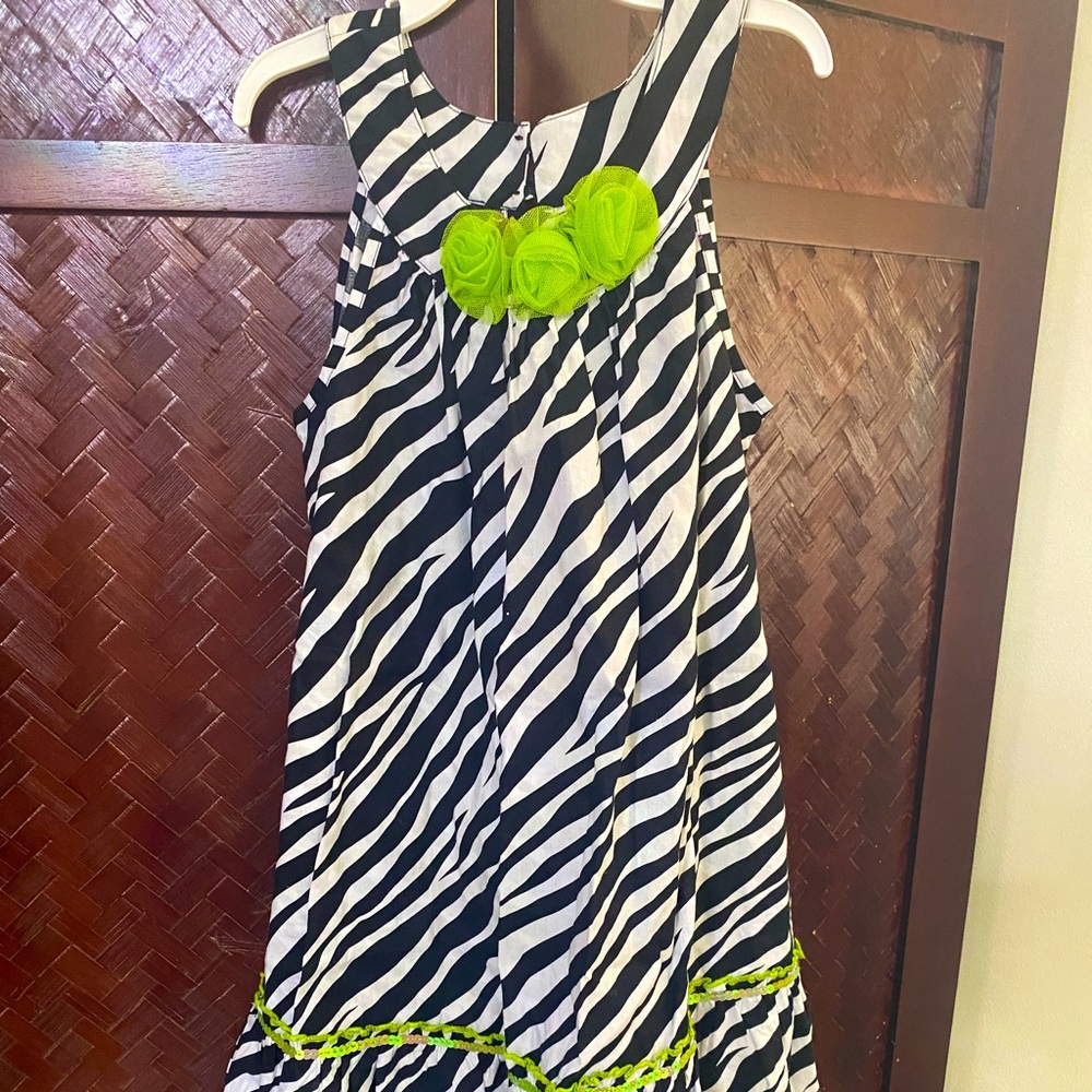 Black and White striped dress with green flowers and designs
